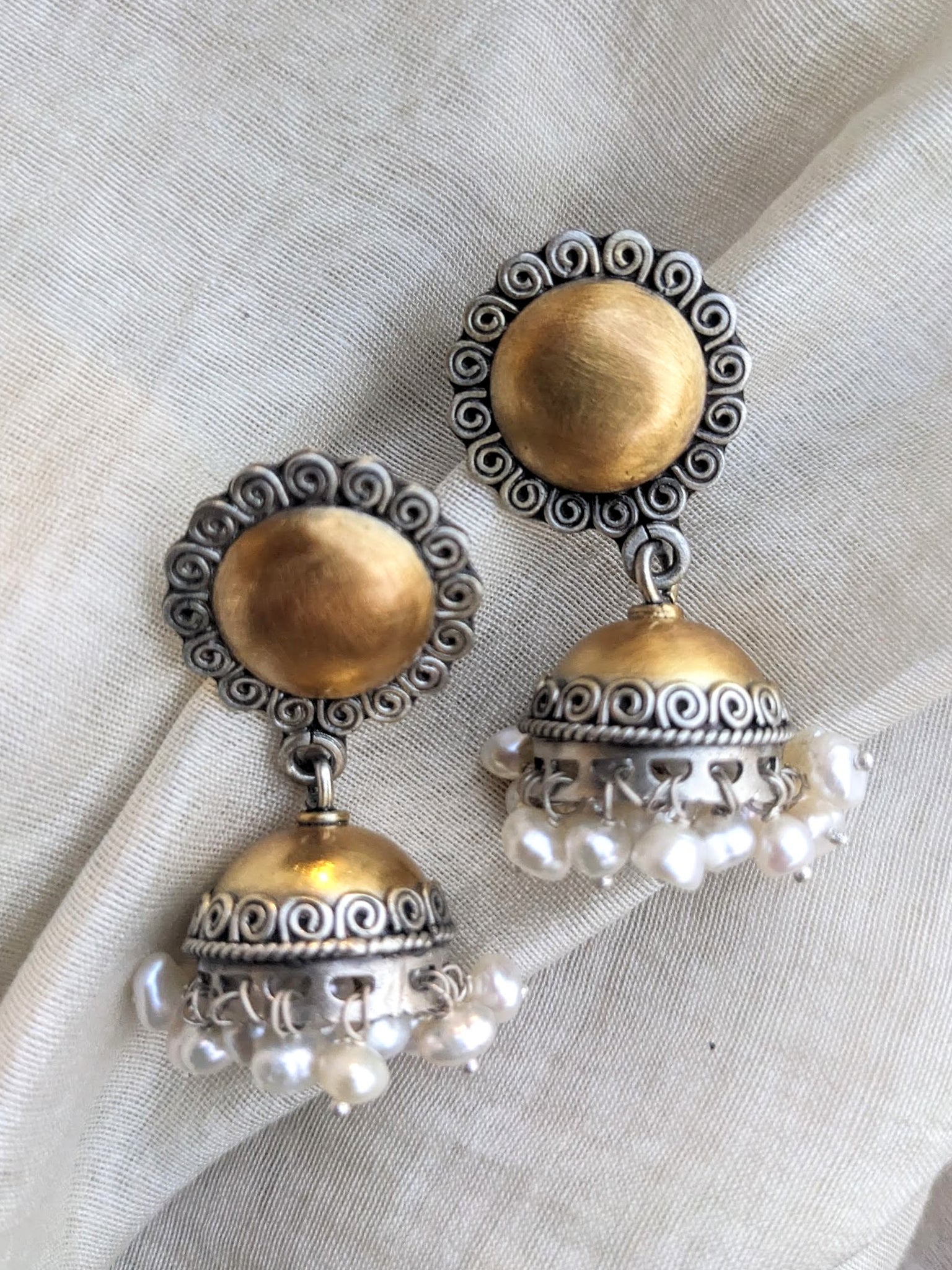Brass And Silver Jhumka With... - Natures Buggy Landscape | Facebook