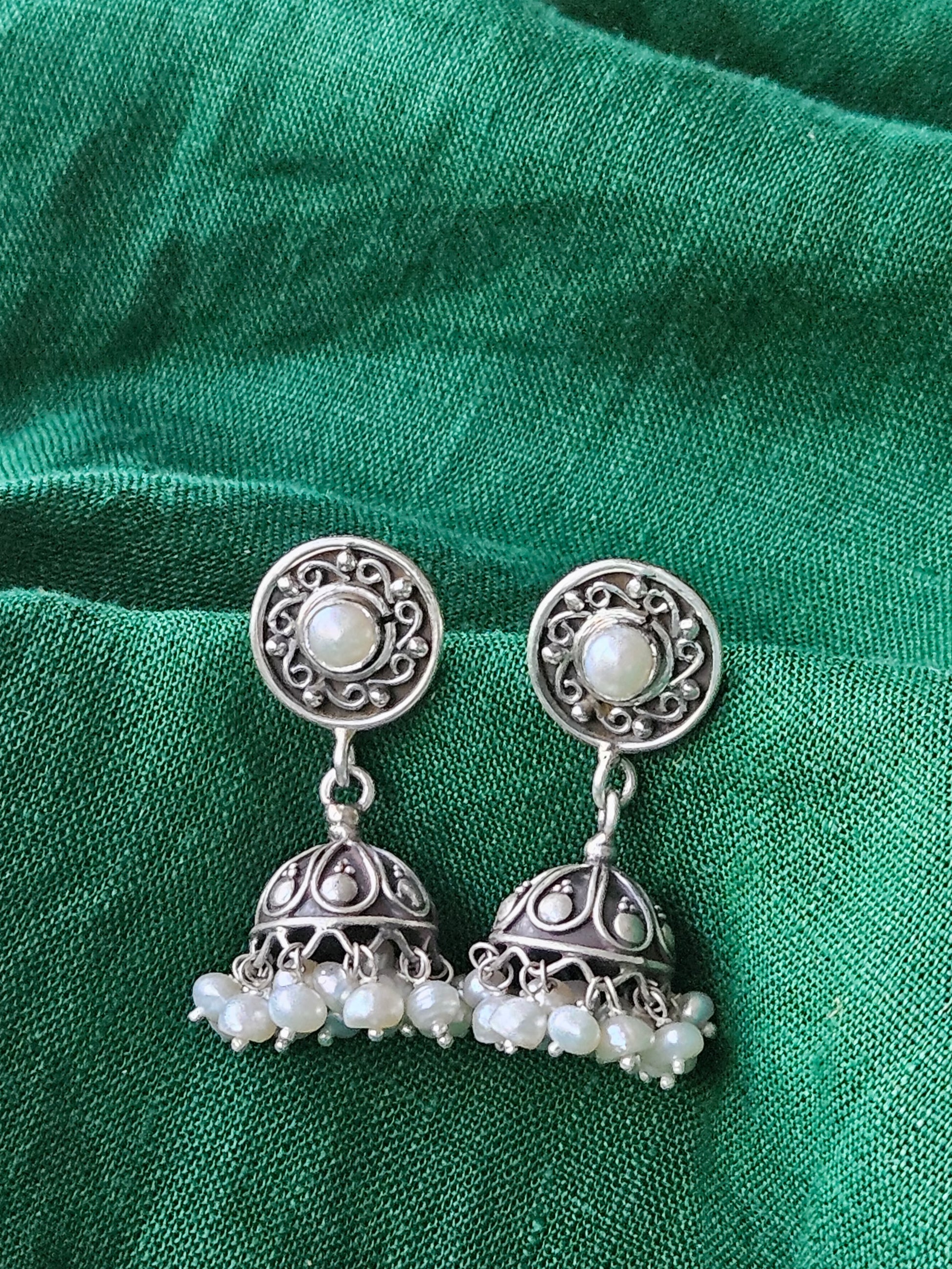 small oxidised finish pure silver jhumka earing with pearl