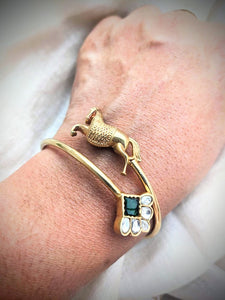 Contemporary pure silver with gold polish horse motif and green stone open bangle