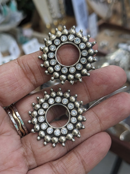 Zirconia Studded round statement silver stud