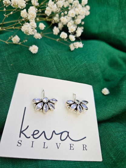 this is a pair of handcrafted 925 sterling silver hook earring in floral petal pattern. Lightweight, easy to wear made in pure silver this silver earring is forever classic. It has indian ethnic feel yet versatile. It makes for a thoughtful silver jewelry gift for women on any occasion. 