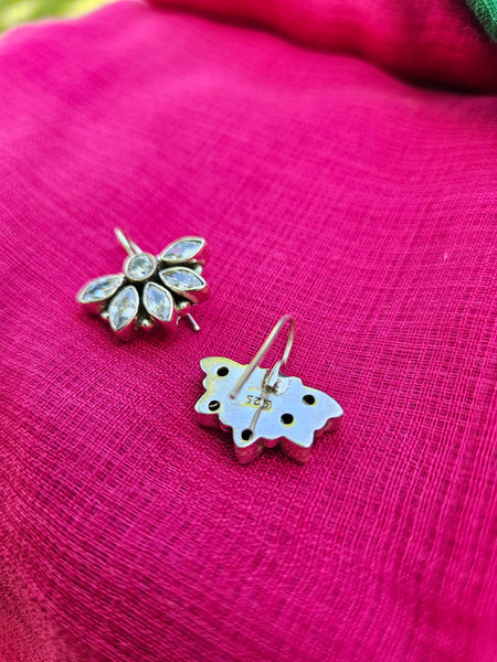 this is a pair of handcrafted 925 sterling silver hook earring in floral petal pattern. Lightweight, easy to wear made in pure silver this silver earring is forever classic. It has indian ethnic feel yet versatile. It makes for a thoughtful silver jewelry gift for women on any occasion. 