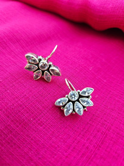 this is a pair of handcrafted 925 sterling silver hook earring in floral petal pattern. Lightweight, easy to wear made in pure silver this silver earring is forever classic. It has indian ethnic feel yet versatile. It makes for a thoughtful silver jewelry gift for women on any occasion. 