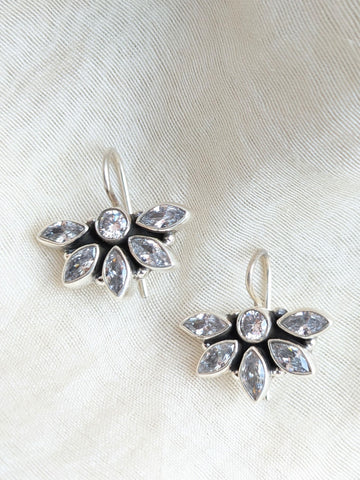 this is a pair of handcrafted 925 sterling silver hook earring in floral petal pattern. Lightweight, easy to wear made in pure silver this silver earring is forever classic. It has indian ethnic feel yet versatile. It makes for a thoughtful silver jewelry gift for women on any occasion. 