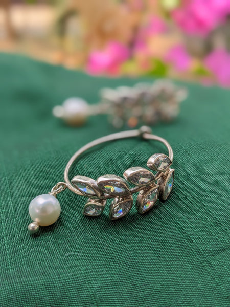 925 Sterling Silver Hoop with Cubic Zirconia Gemstones. Gemstones are designed in a leafy vine form. They add sparkle to this beautiful hoop earring. In addition there is a drop pearl which  adds movement and grace. Made by artisans by hand in Jaipur,India in pure sterling silver. #silverisforever #kevasilver #kevadesign